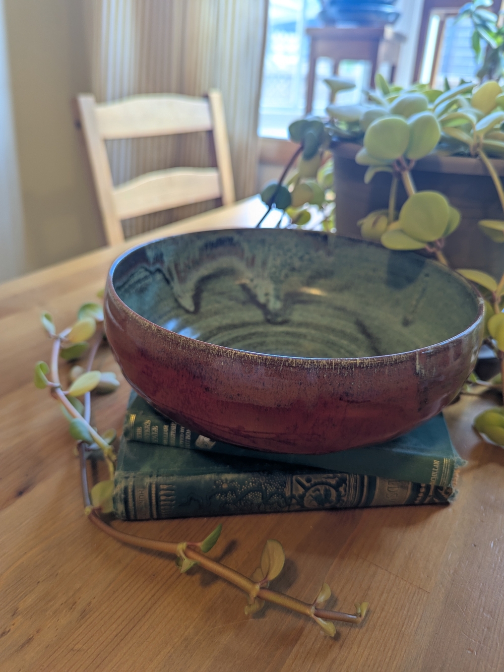 Handcrafted Red Pottery Bowl With Teal Interior